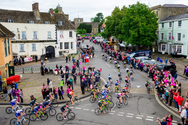 A group of cyclists cycle through Faringdon