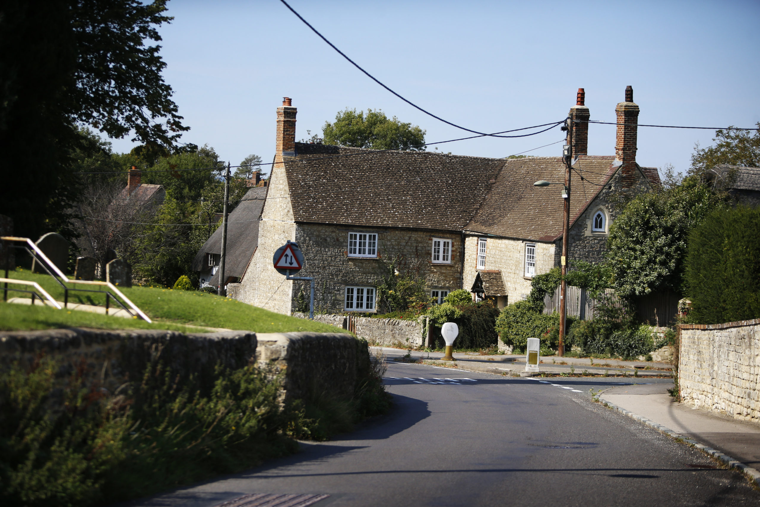 a picture of a road and house in Cumnor