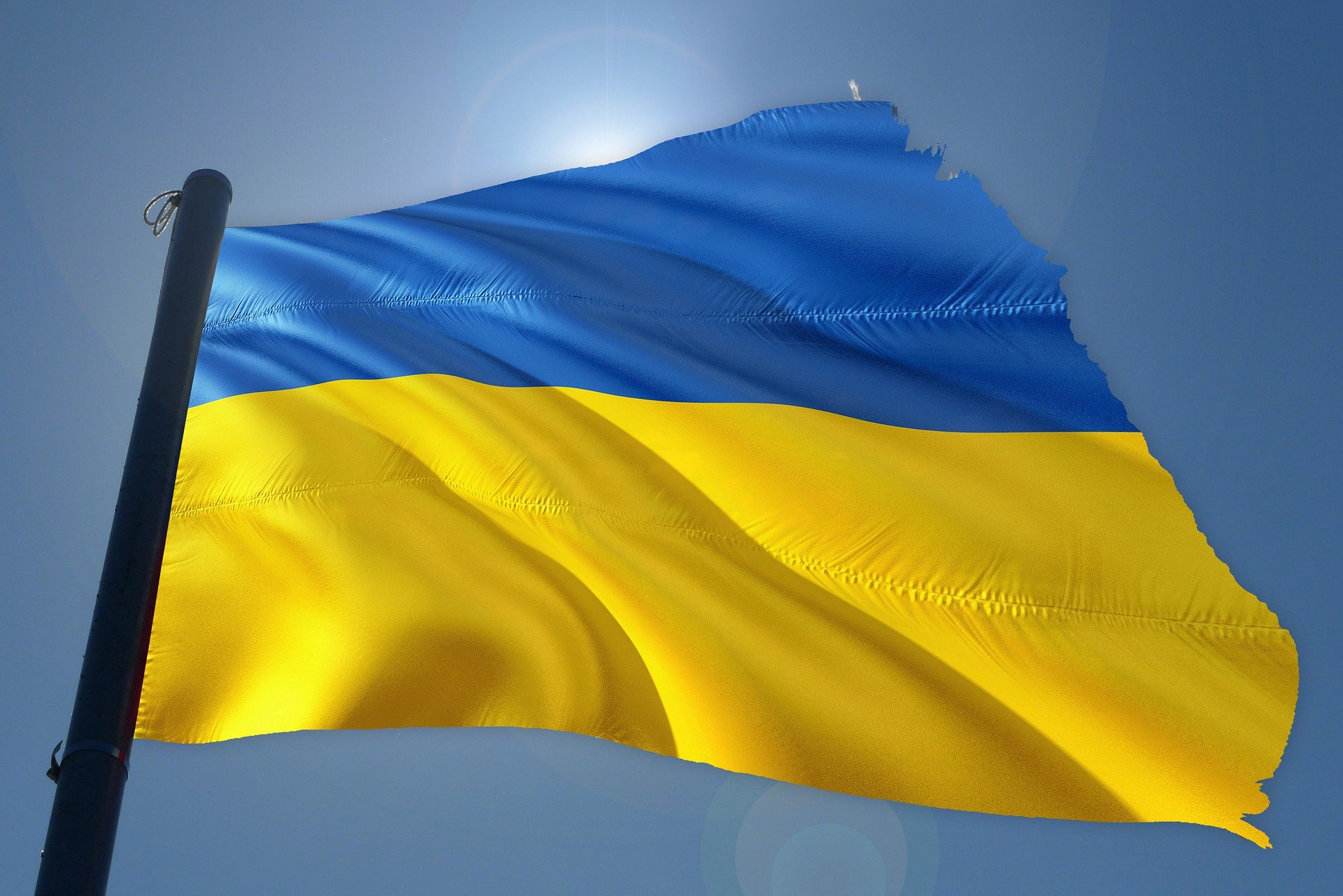 Ukraine flag fluttering on flagpole