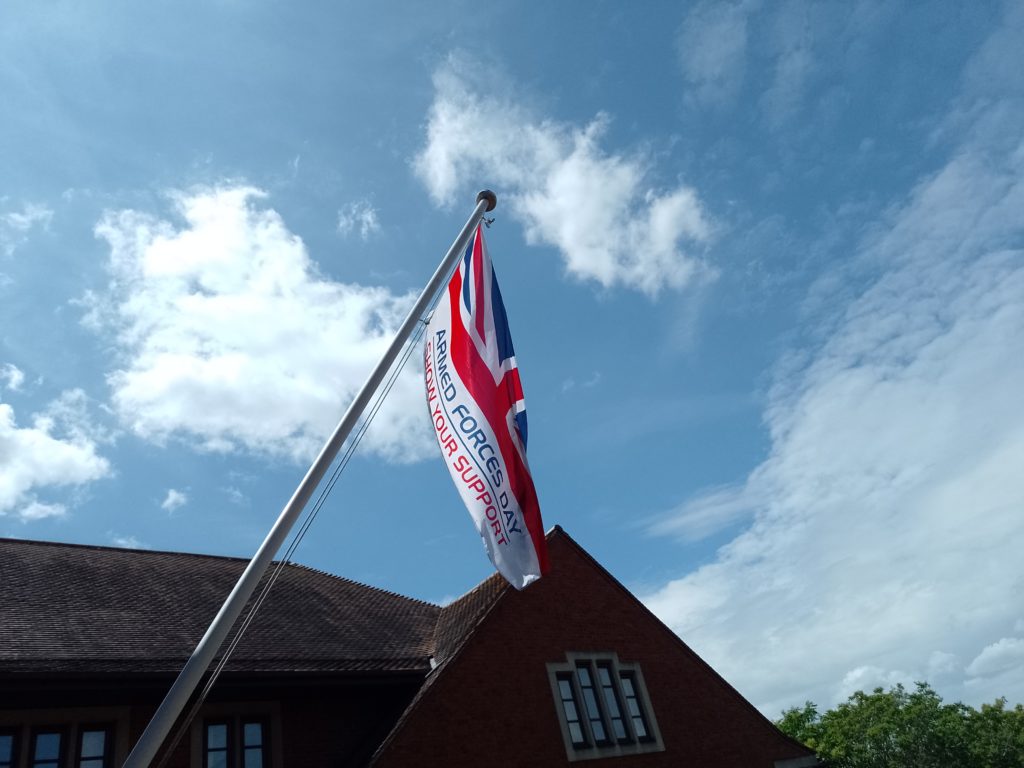 photo of the Armed Forces Day Flag flying above Abbey House